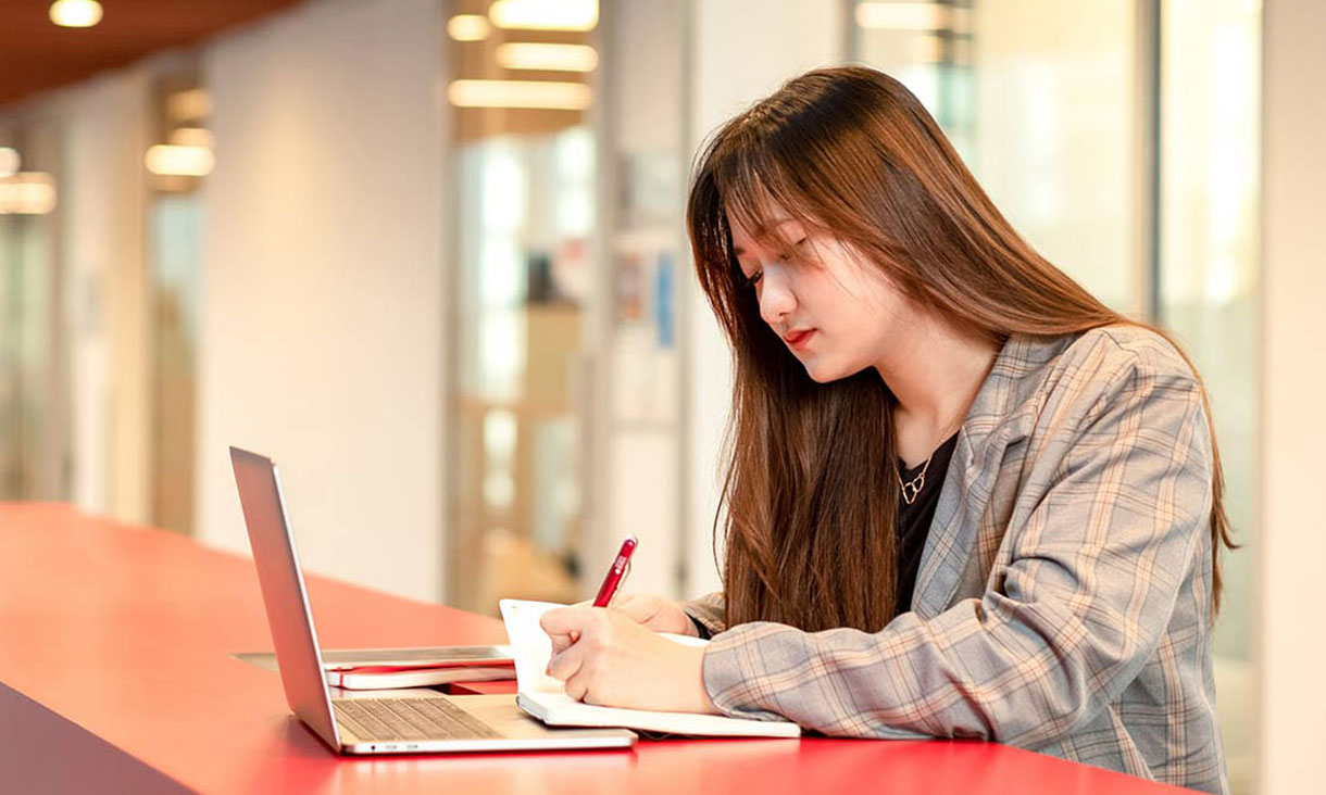 Student studying with laptop