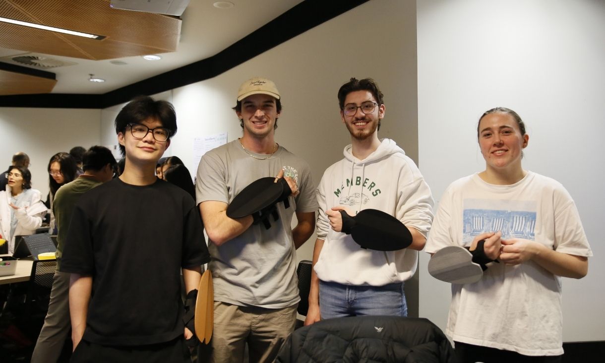 Biomedical engineering students showcasing technology